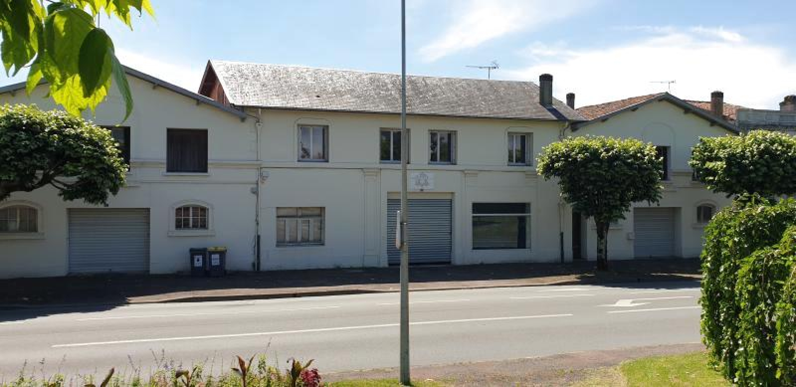 vente-immeuble-centre-ville-de-2000-m2-avec-appartements-r-seau-expertimo