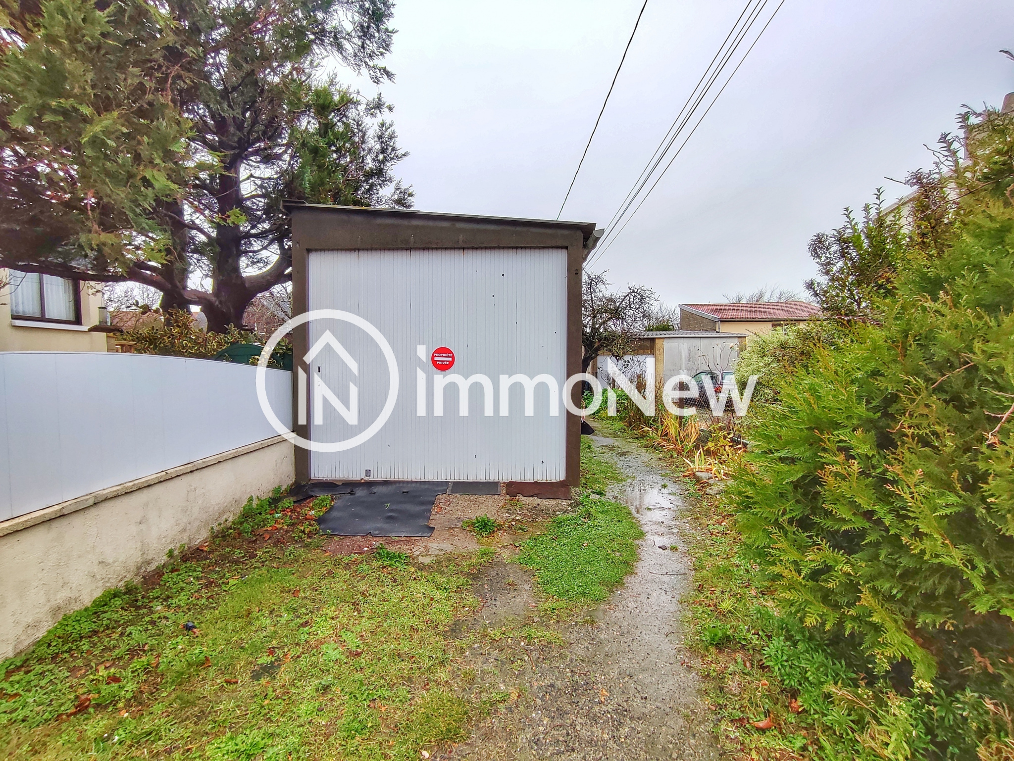 Vente TERRAIN CONSTRUCTIBLE AVEC GARAGE A GRANVILLE Réseau Expertimo